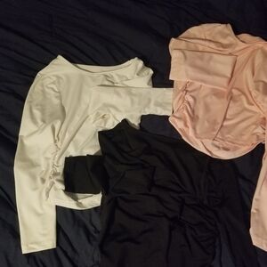 White, Black, and Pink Long Sleeve Tops
